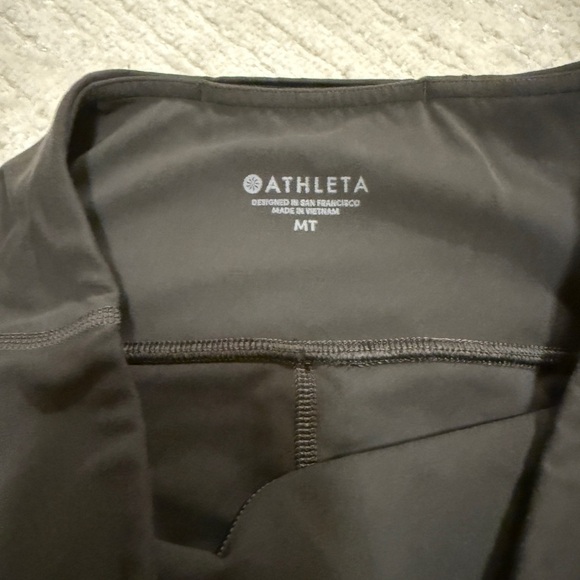 Athleta Green Bike Shorts with Snug Fit and Wide Waistband - Picture 4 of 4